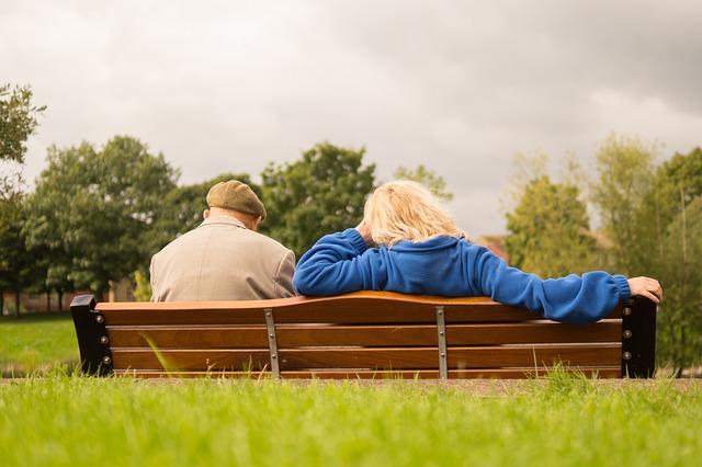 Couple Sitting on a Park Bench