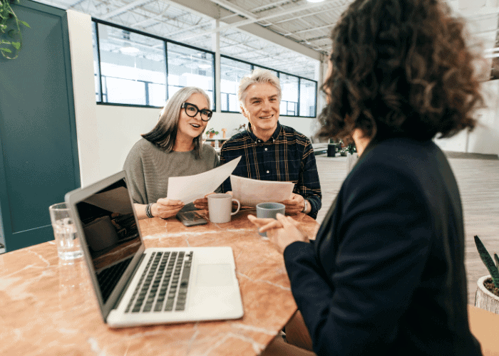 senior couple with estate planning attorney in Howell